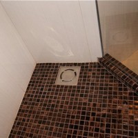 How to make a shower drain in a floor under tiles: construction and installation guide