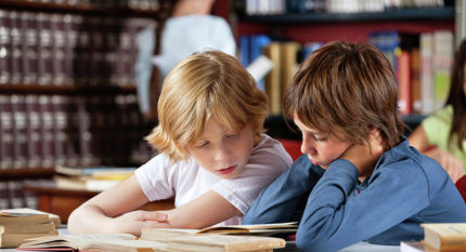 Children reading a book