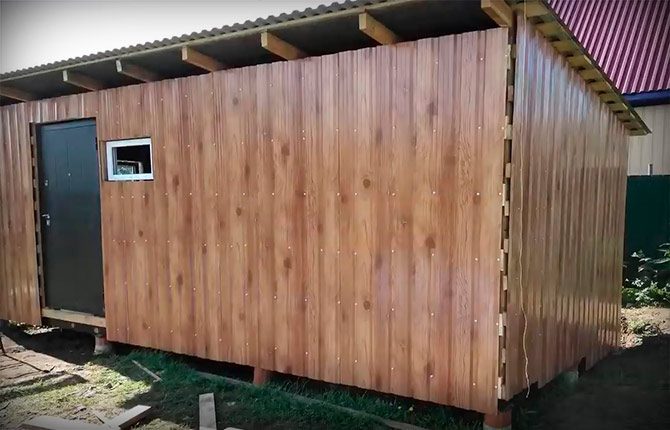 laying corrugated sheets on a single-pitched base